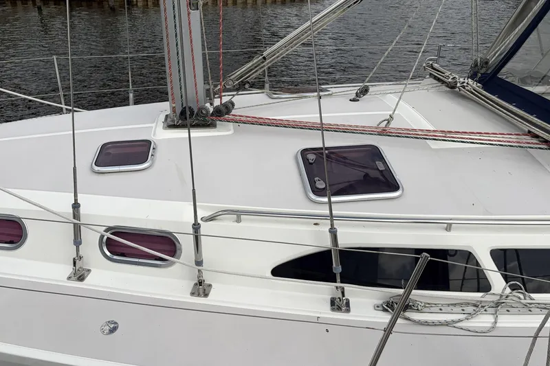 Slide: The Image of 2004 Catalina 36 MkII sailboat deck with hatches and rigging details. - 12