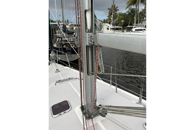 Slide: The Image of 2004 Catalina 36 MkII sailboat mast and rigging at marina. - 15