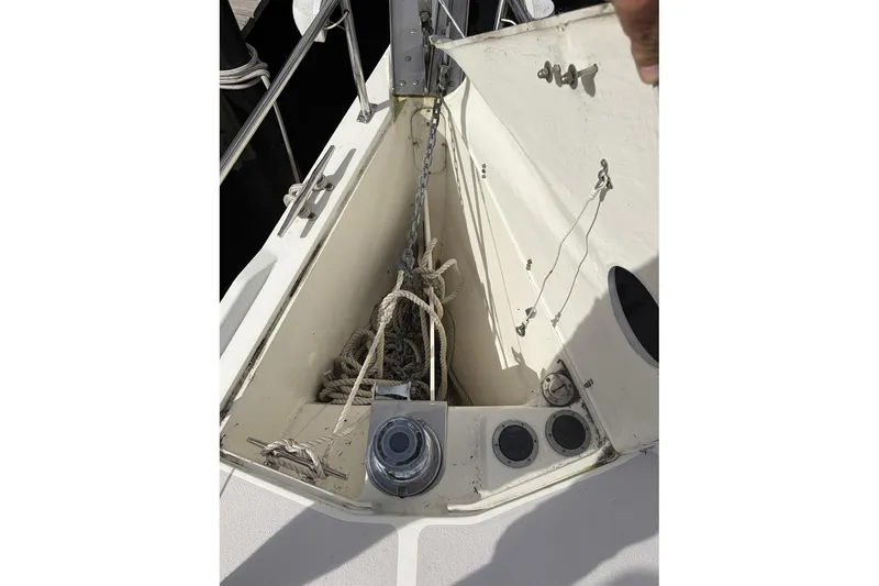 Slide: The Image of Anchor locker of a 2004 Catalina 36 MkII sailboat with ropes and chain. - 17