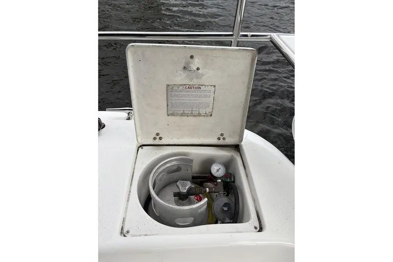 Slide: The Image of Open propane storage compartment on 2004 Catalina 36 MkII sailboat. - 18
