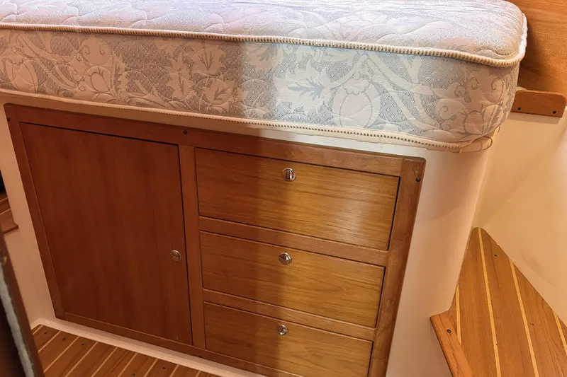 Slide: The Image of Wooden cabin storage with floral mattress in 2004 Catalina 36 MkII sailboat. - 32