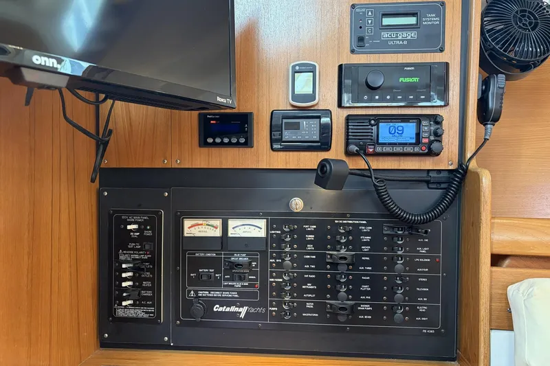 Slide: The Image of Control panel of a 2004 Catalina 36 MkII yacht with various electronic devices. - 40
