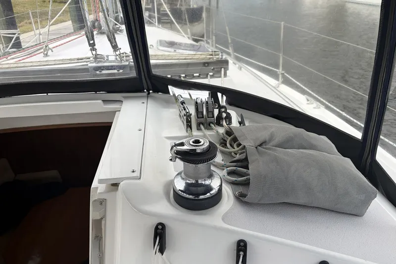 Slide: The Image of Cockpit view of a 2004 Catalina 36 MkII sailboat with winch and ropes. - 8