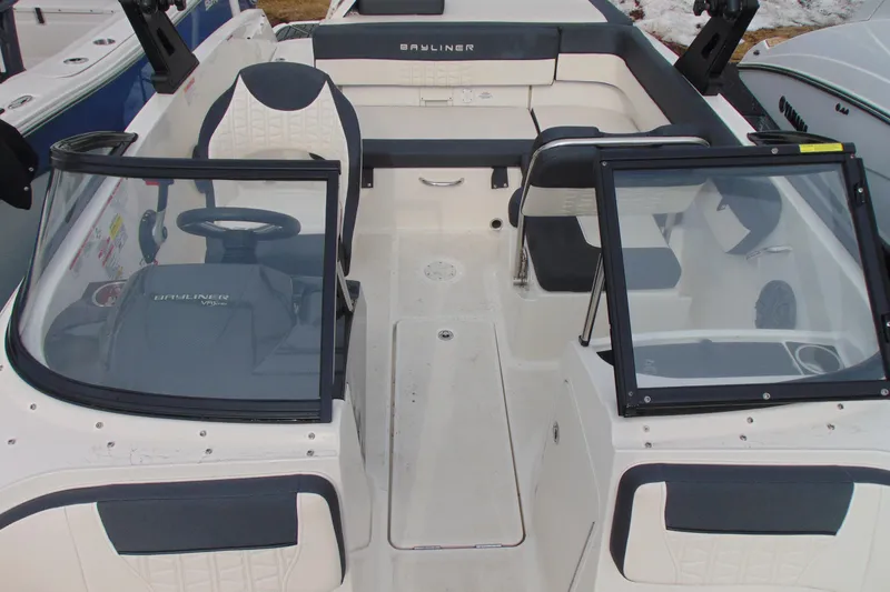 Slide: The Image of 2021 Bayliner VR5 Bowrider I/O interior with seating and steering wheel. - 17