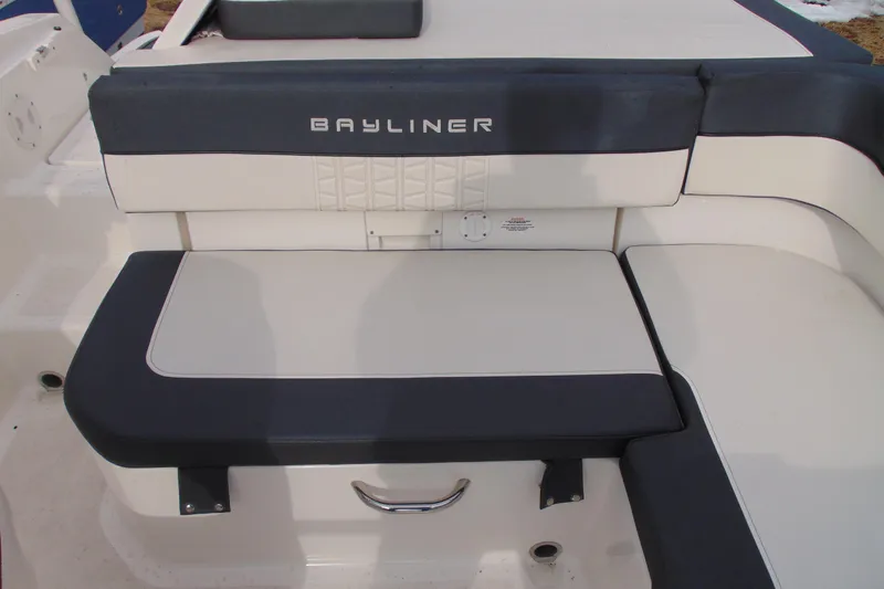 Slide: The Image of 2021 Bayliner VR5 Bowrider I/O boat seating area with cushioned upholstery. - 19