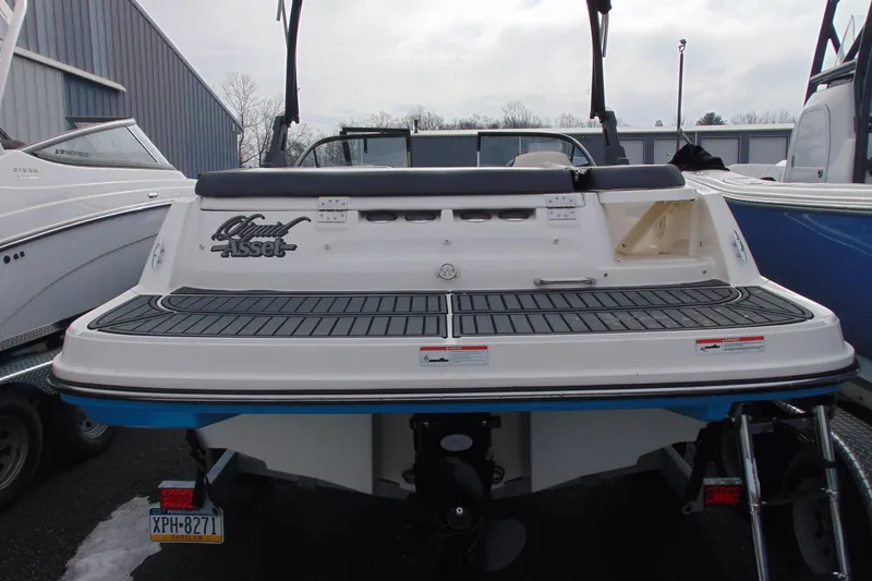 Slide: The Image of 2021 Bayliner VR5 Bowrider I/O boat, rear view, parked on trailer. - 5