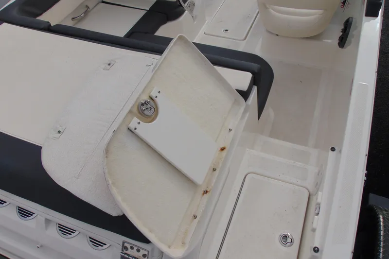 Slide: The Image of 2021 Bayliner VR5 Bowrider I/O interior, featuring seating and storage compartments. - 8