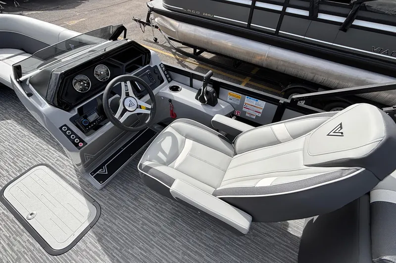 Slide: The Image of 2026 Viaggio X24U boat interior with modern dashboard and comfortable seating. - 11