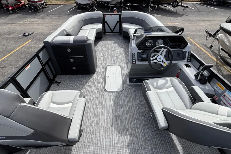 Slide: The Image of 2026 Viaggio X24U pontoon boat interior with modern seating and sleek dashboard design. - 23