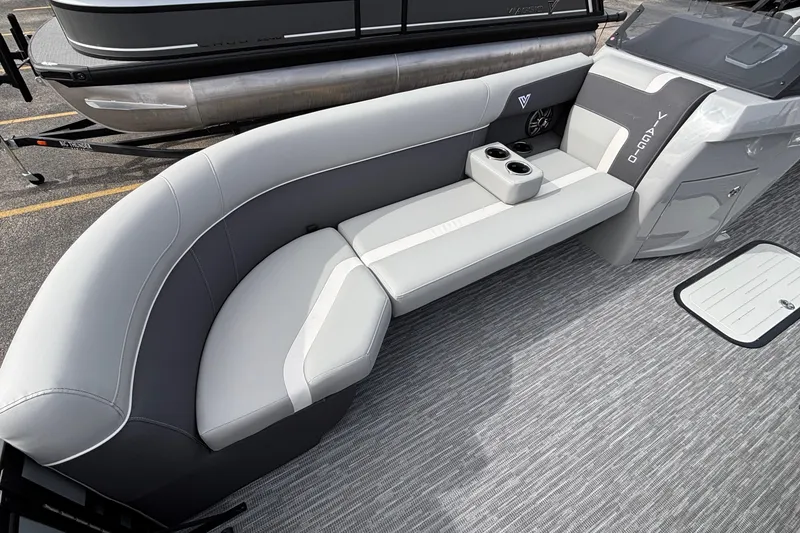 Slide: The Image of Luxurious seating on 2026 Viaggio X24U boat with sleek gray upholstery and cup holders. - 28
