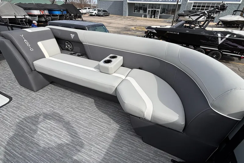 Slide: The Image of 2026 Viaggio X24U boat interior with gray seating and cup holders. - 29
