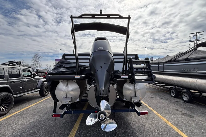 Slide: The Image of Rear view of 2026 Viaggio X24U boat with powerful outboard motor in parking lot. - 34