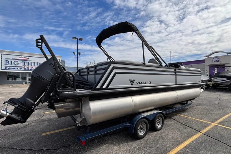 Slide: The Image of 2026 Viaggio X24U pontoon boat on trailer at dealership parking lot. - 35