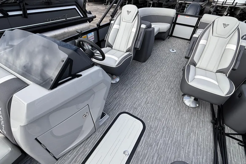 Slide: The Image of Interior of 2026 Viaggio X24U boat with modern seating and steering console. - 7