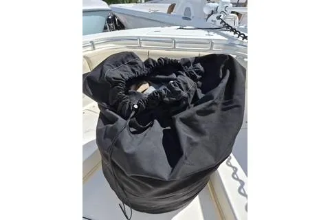 Slide: The Image of Black cover on 2016 Cobia 277 Center Console boat deck. - 16