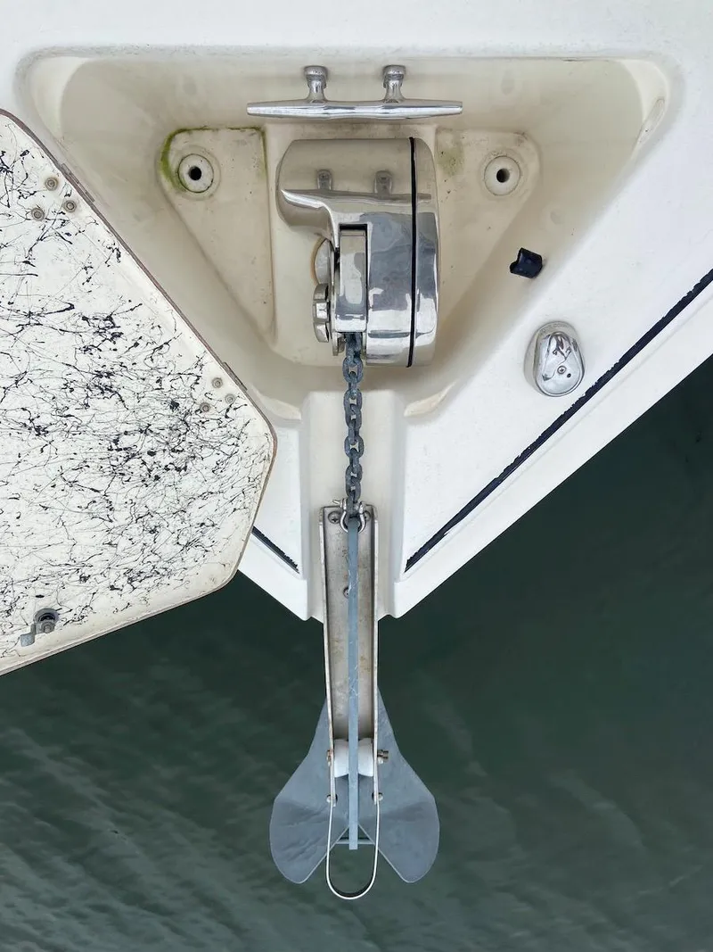 Slide: The Image of Anchor of a 2000 Rinker Fiesta Vee 310 boat. - 13