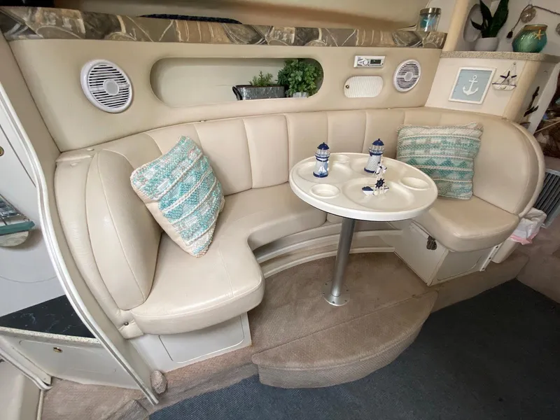 Slide: The Image of Interior of 2000 Rinker Fiesta Vee 310 boat with seating area. - 17