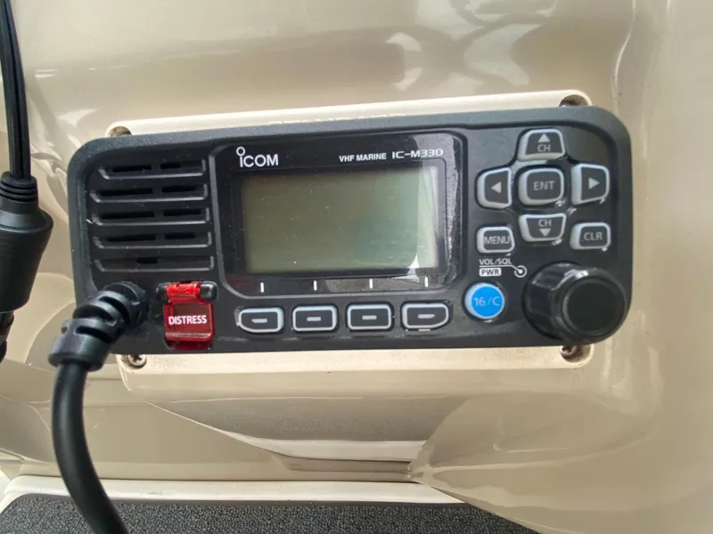Slide: The Image of ICOM VHF marine radio on 2000 Rinker Fiesta Vee 310. - 7