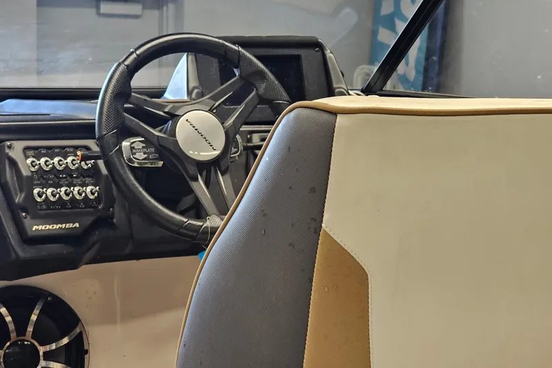 Slide: The Image of 2019 Moomba Makai boat interior with steering wheel and control panel. - 22