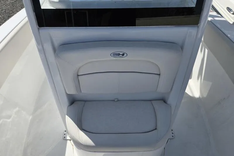 Slide: The Image of 2023 Sea Hunt Ultra 239 SE boat seat with logo, featuring sleek design and comfortable cushioning. - 15