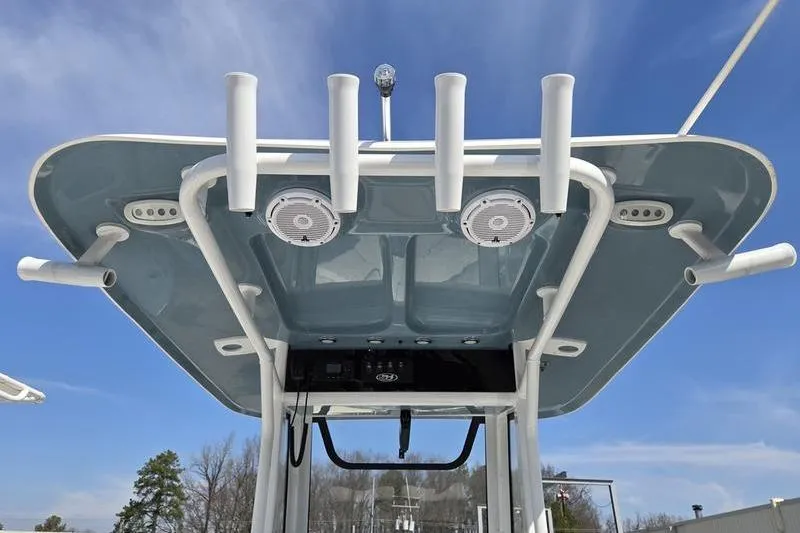Slide: The Image of 2023 Sea Hunt Ultra 239 SE boat top view with rod holders and speakers. - 8