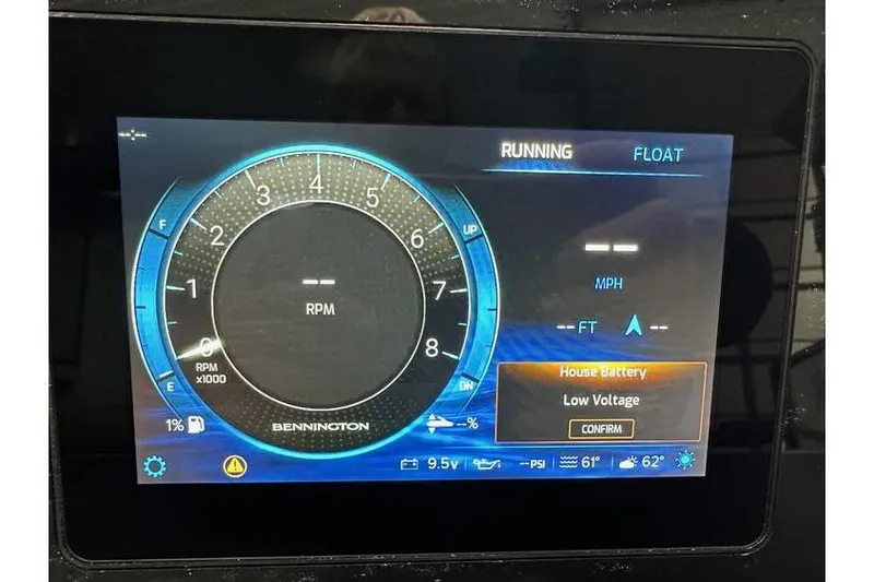 Slide: The Image of Dashboard display of 2026 Bennington 22 SSR Quad Bench, showing RPM and low battery alert. - 23