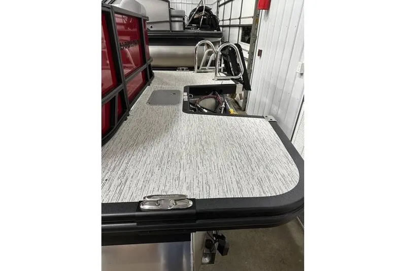 Slide: The Image of 2026 Bennington 22 SSR Quad Bench boat interior with sleek design and modern features. - 33