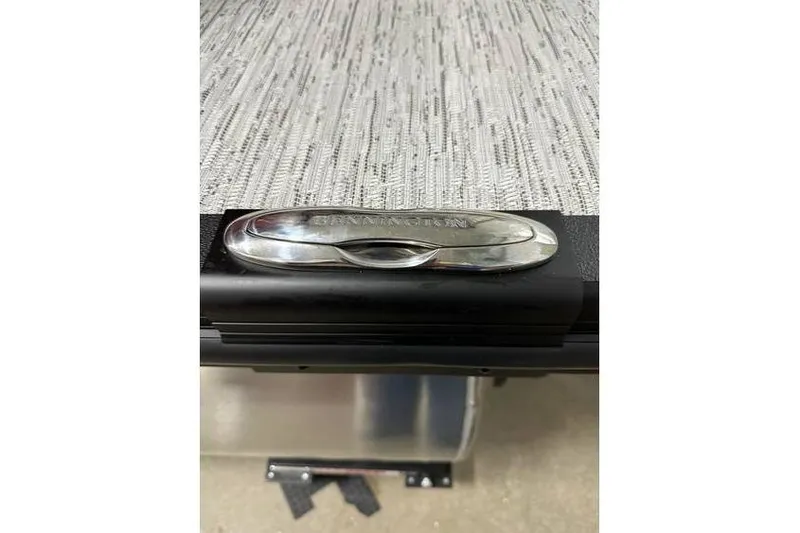 Slide: The Image of 2026 Bennington 22 SSR Quad Bench, close-up of branded metal detail. - 34