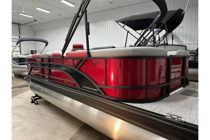Slide: The Image of 2026 Bennington 22 SSR Quad Bench pontoon boat in stock, vibrant red exterior. - 6