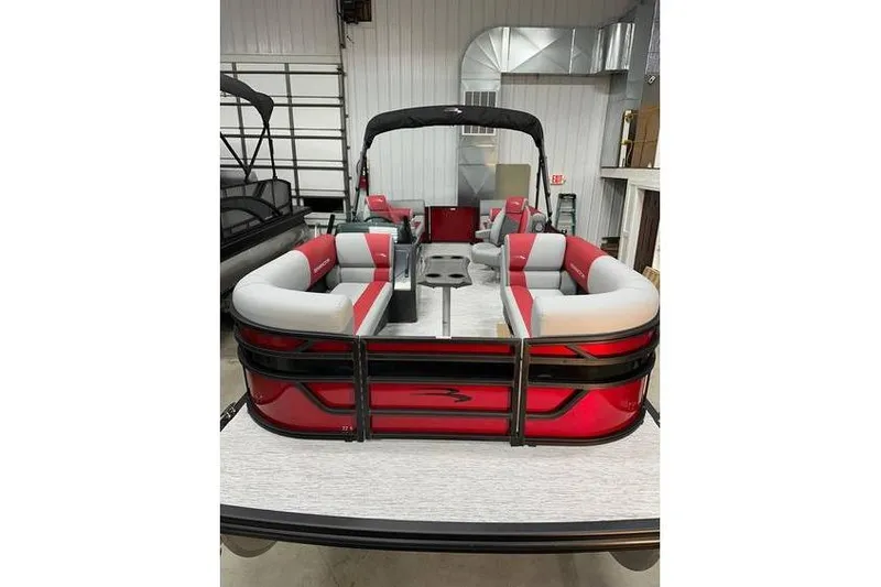 Slide: The Image of 2026 Bennington 22 SSR Quad Bench pontoon boat with red and gray seating, in stock. - 8