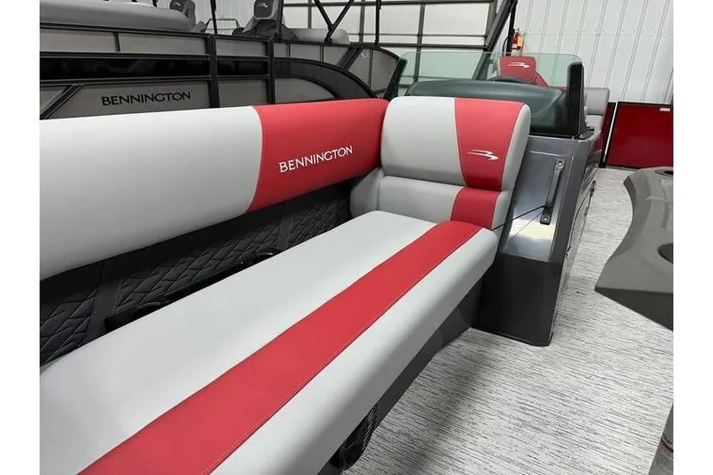 Slide: The Image of 2026 Bennington 22 SSR Quad Bench with red and gray seating in stock. - 9