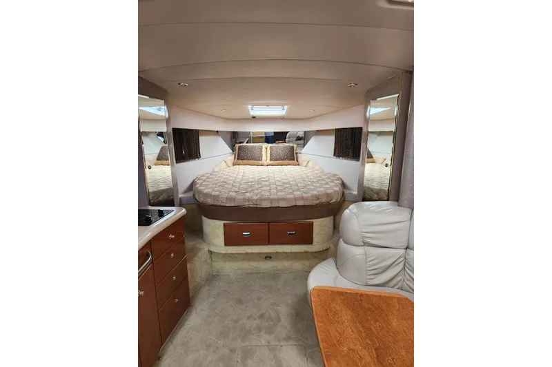 Slide: The Image of Interior of 2004 Formula 37 Performance Cruiser with cozy bed and seating area. - 3