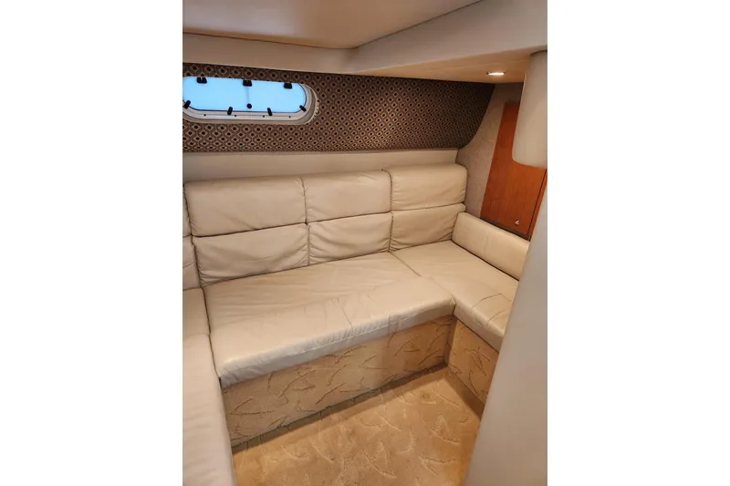 Slide: The Image of Luxurious interior of 2004 Formula 37 Performance Cruiser with beige leather seating. - 7
