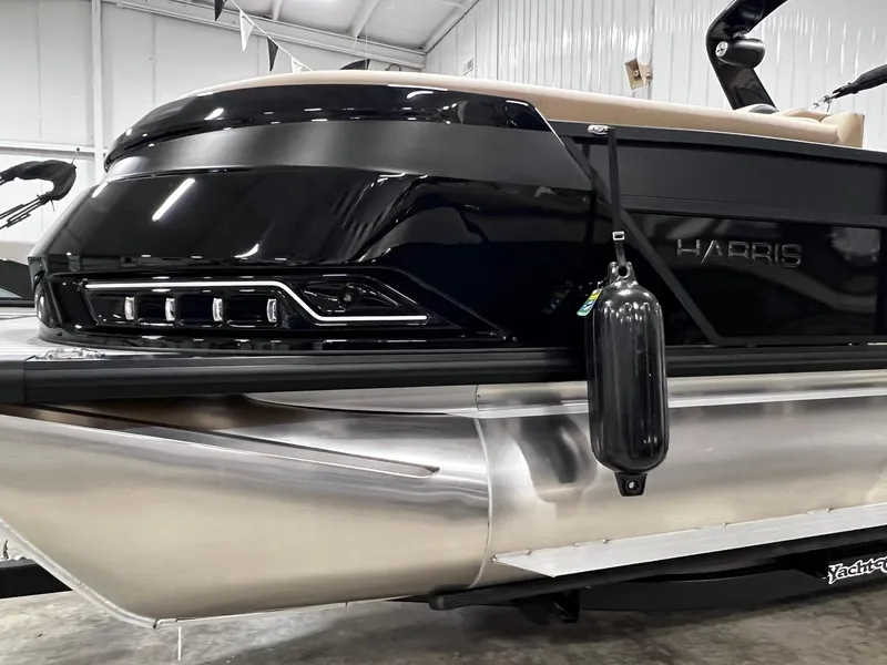 Slide: The Image of 2024 Harris 250 Grand Mariner V10 400 pontoon boat in showroom. - 21