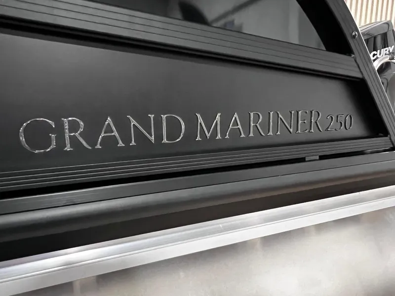 Slide: The Image of 2024 Harris 250 Grand Mariner V10 400 boat nameplate detail. - 35