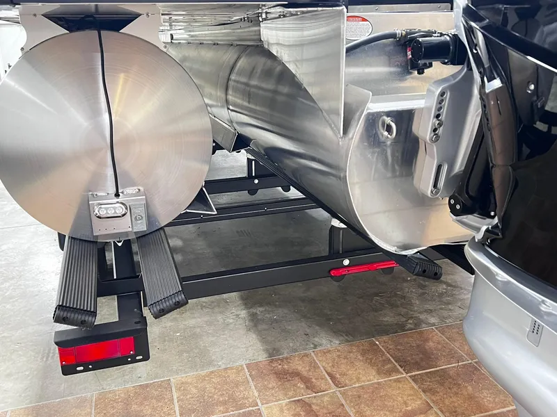 Slide: The Image of 2024 Harris 250 Grand Mariner V10 400 pontoon boat underside and motor detail. - 36