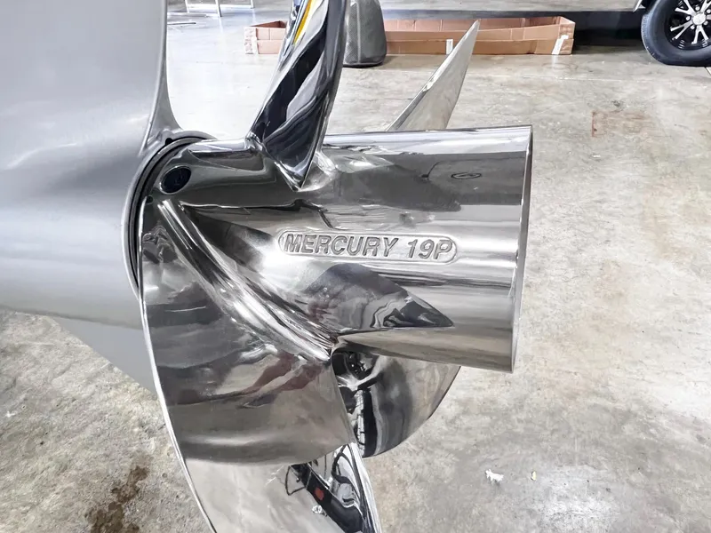 Slide: The Image of Close-up of a Mercury 19P propeller on a 2024 Harris 250 Grand Mariner V10 400 boat. - 37