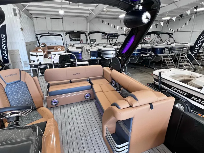 Slide: The Image of 2024 Harris 250 Grand Mariner V10 400 pontoon boat interior with luxurious seating. - 6