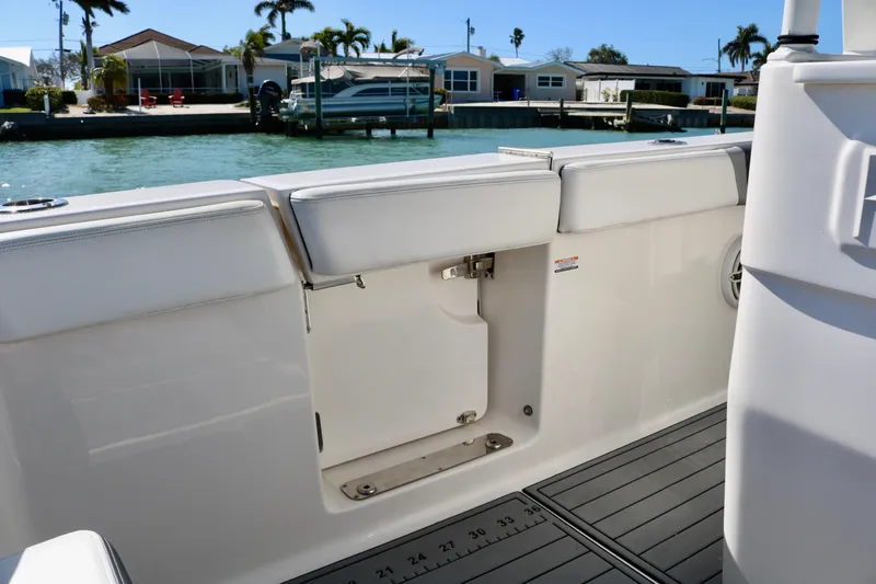 Slide: The Image of 2020 Robalo R272 Center Console boat interior with open transom door. - 30