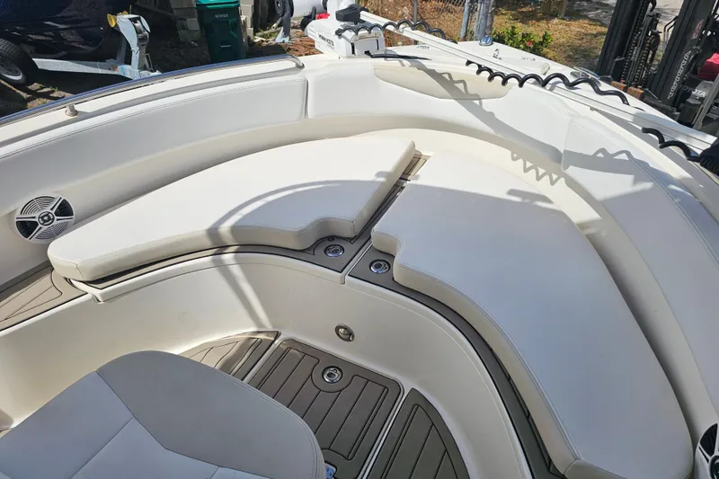 Slide: The Image of Open storage compartment on 2015 Robalo R222 Center Console boat. - 27