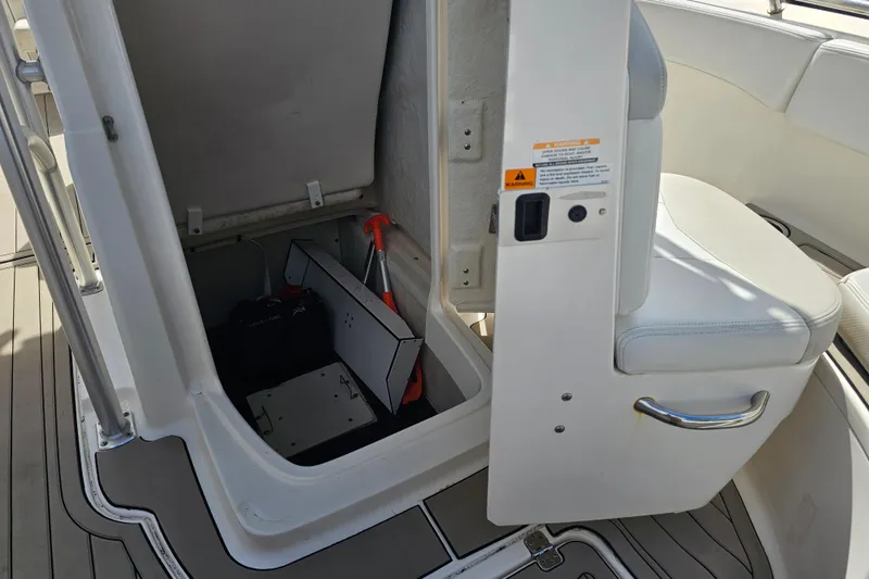Slide: The Image of 2015 Robalo R222 Center Console boat battery compartment with wiring. - 30