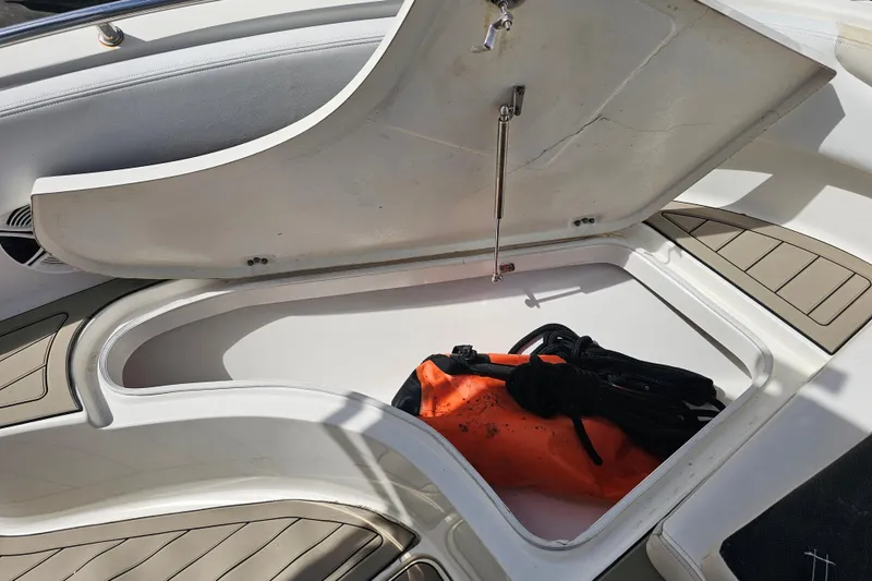 Slide: The Image of Clarion audio system on 2015 Robalo R222 Center Console boat dashboard. - 33