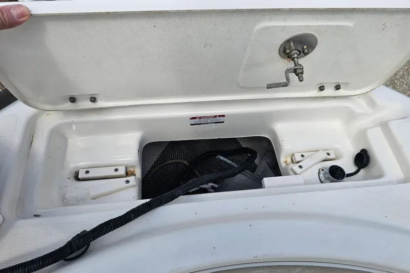 Slide: The Image of Yamaha gauges and switches on 2015 Robalo R222 Center Console boat dashboard. - 34