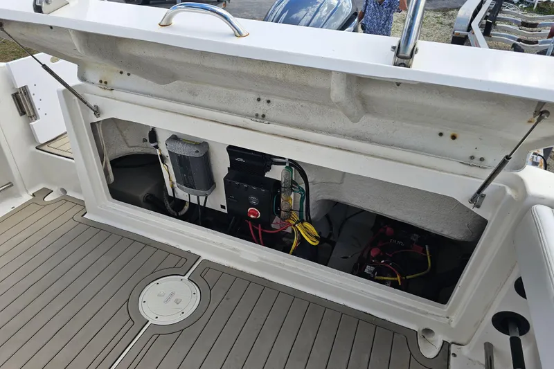 Slide: The Image of Electrical panel with switches and wiring in 2015 Robalo R222 Center Console boat. - 36