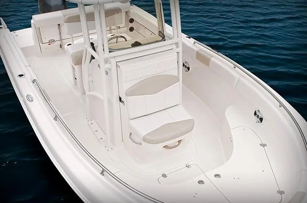 Slide: The Image of 2015 Robalo R222 Center Console boat on trailer, Florida registration visible. - 4