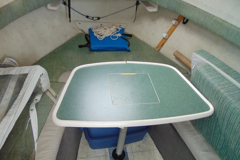 Slide: The Image of Interior cabin of 2000 Bayliner 2302 Trophy Walkaround DX/LX with table and seating. - 19