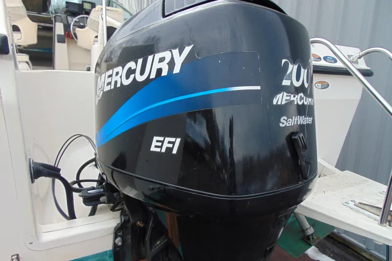Slide: The Image of Mercury EFI outboard engine on 2000 Bayliner 2302 Trophy Walkaround DX/LX boat. - 5