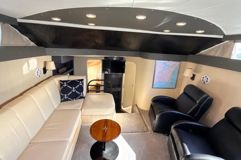 Slide: The Image of Luxurious interior of 1998 Mainship 47 Motor Yacht with plush seating and elegant decor. - 40