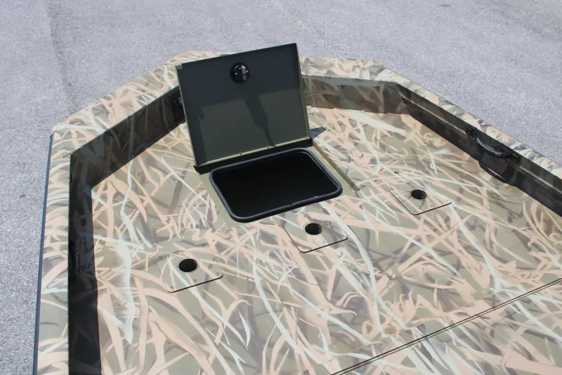 Slide: The Image of Lowe Outlet 20 boat 2025 with camouflage pattern and storage compartment. - 12
