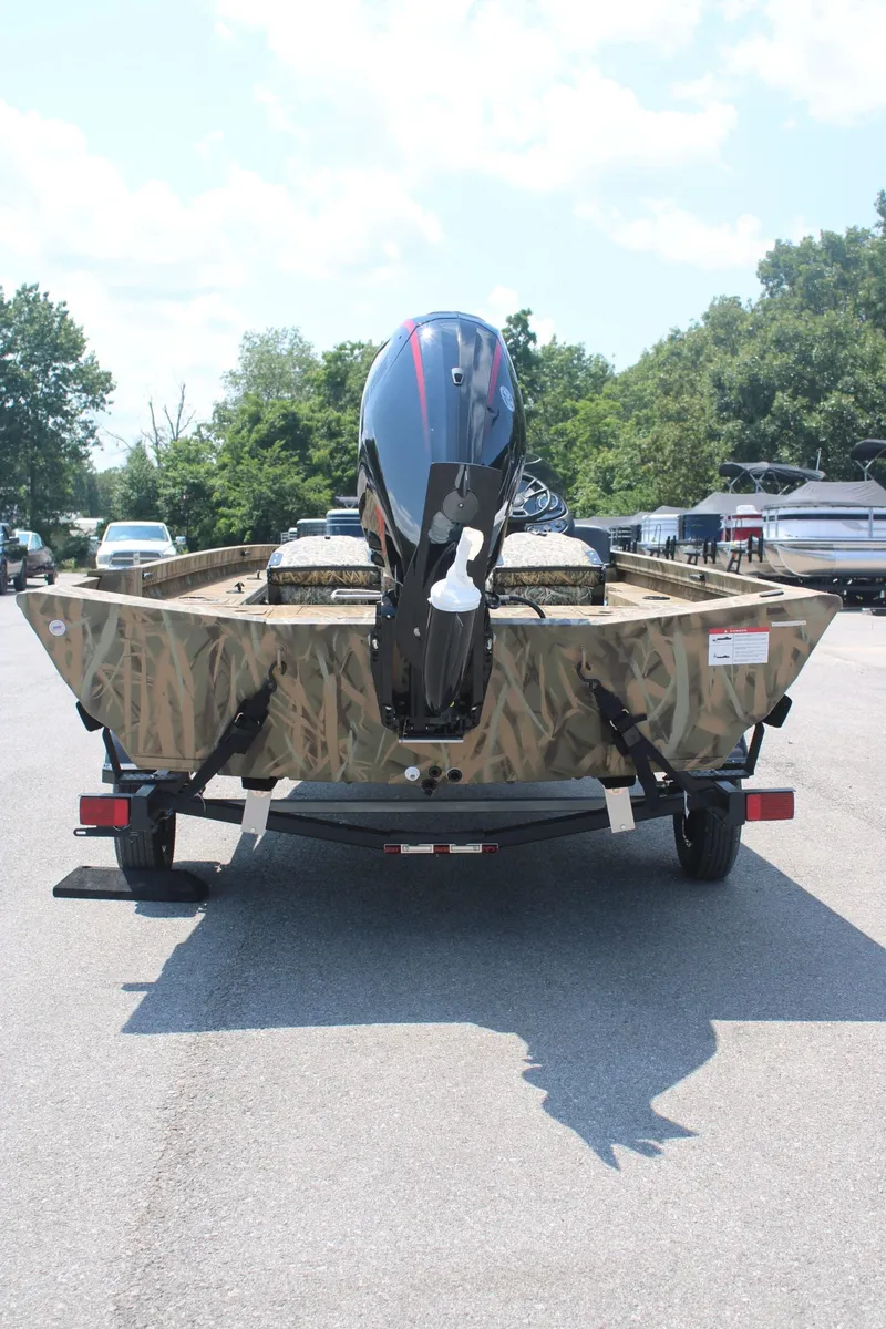 Slide: The Image of Rear view of a 2025 Lowe Outlet 20 boat on a trailer. - 3